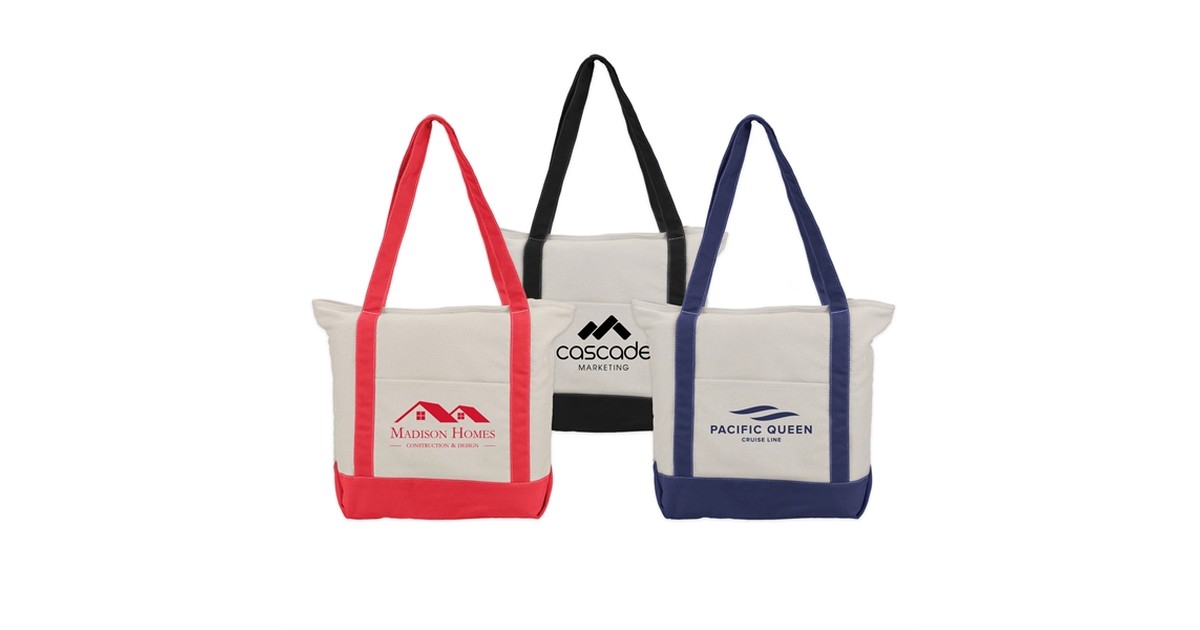 Three cotton canvas boat totes with red, black and navy handles, each screen printed with a different sample business logo